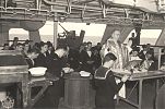 Fr. Michael MacIsaac celebrates Mass on board the destroyer "Magnificent". A navy chaplain, he served from 1942 to 1957. Photo credit: National Defence Photograph Canada.